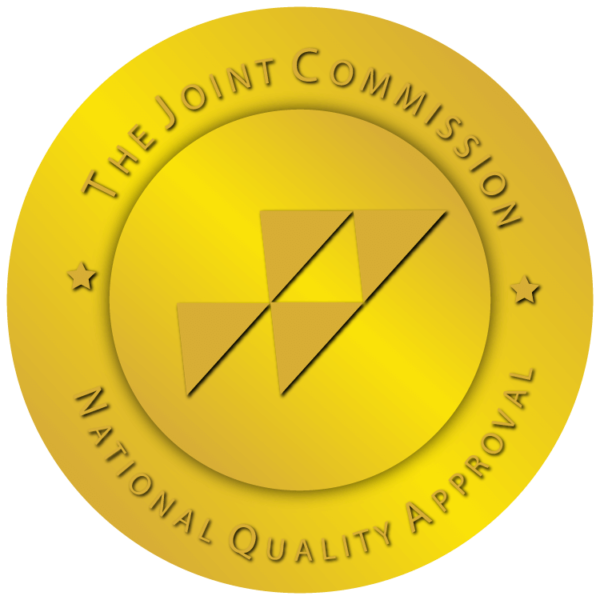 A yellow circular seal with the text 